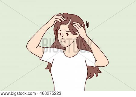 Woman Suffering From Hair Loss Touching Head Looking At Scar Through Mirror. Girl With Sad Face Look