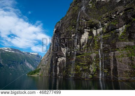 A Rainbow Reflected In The Streams Of The Waterfall Brudesløret, On The Cliffs Around Geiranger Fjor