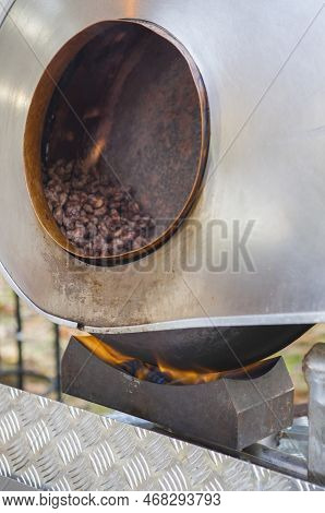 Garrapinadas Processing At Rotatory Pot. Traditional Caramel-coated Almonds Been Processed At Fair S