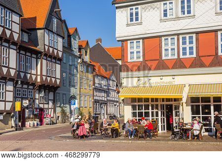 Wolfenbuttel, Germany - March 23, 2022: People At A Cafe On The Central Market Square In Wolfenbutte
