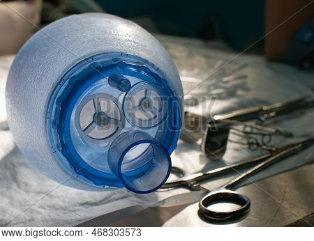 A Medical Oxygen Bag In Surgery Lies On A Table With Instruments. The Ambu Bag Is Needed For Emergen