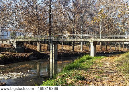 View Of The City Of Trikala, Recreation Area, Bridge And The Embankment Of The Historical Litheos Ri