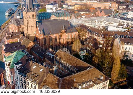 Skyline Of Dusseldorf With Church View Near Canal.