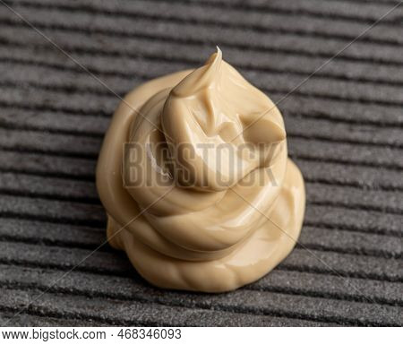 Yellow Car Polishing Paste, Close-up. Finishing Car Body Polish