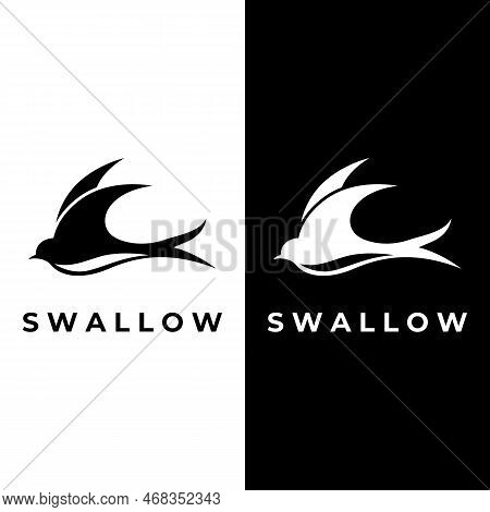 Simple Logo Template Design Silhouette Of A Martin Martlet Swallow Flying Hovering.