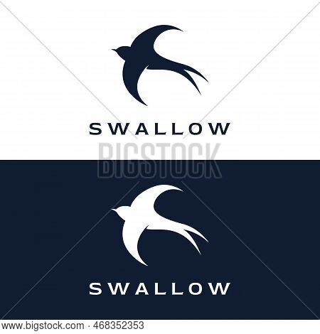 Simple Logo Template Design Silhouette Of A Martin Martlet Swallow Flying Hovering.