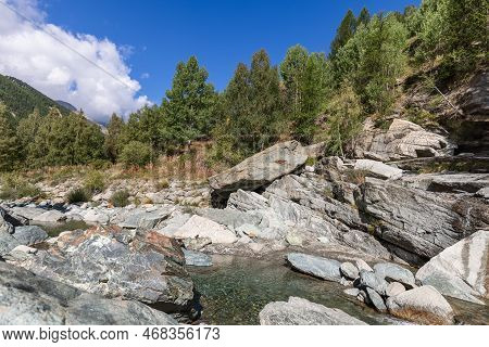 Lillaz Waterfall (cascate Di Lillaz) In Forest Feeds Into The Torrente Grand Eyvia In The Parco Nazi