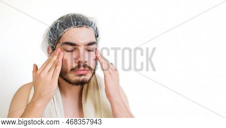 Young Man With Moisturizer On The Face.