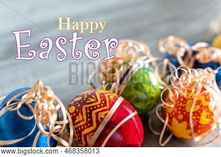 Close Up Of Colorful Easter Eggs On Gray Background.