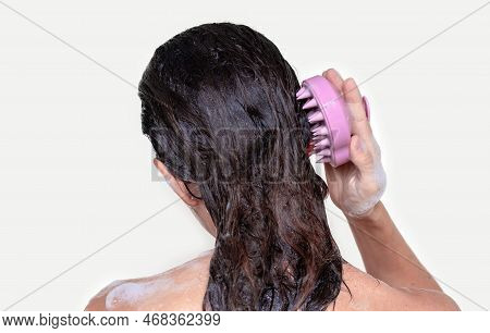 Hair Growth Stimulating, Scalp Massage.woman Use Massager Shampoo Brush