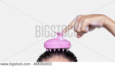 Hair Growth Stimulating, Scalp Massage.woman Use Massager Shampoo Brush
