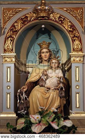 Karlovac, Croatia - July 06, 2012: Our Lady Of The Scapular, Statue On The Main Altar In The Parish 
