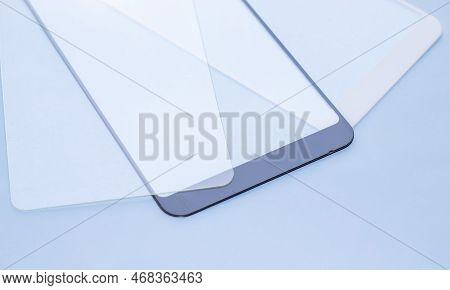 Maintenance And Repairing Smartphones. Many Tempered Glass Screen Protector