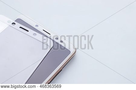 Maintenance And Repairing Smartphones. Many Tempered Glass Screen Protector