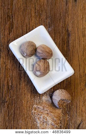 Nutmegs In Porcelain Bowl