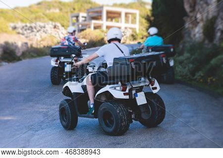 Group Of Riders Riding Atv Vehicle Crossing Mountain Serpentine Road Track, Process Of Driving Renta