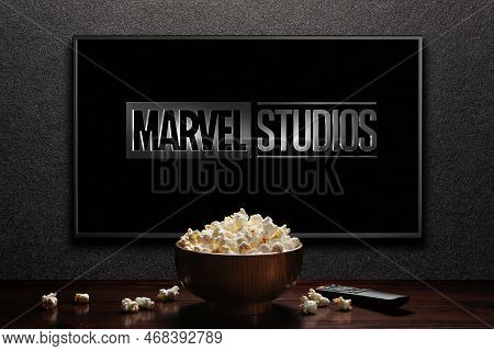 Tv Screen Playing Marvel Studios Movie. Tv With Remote Control, Popcorn Bowl. Moscow, Russia - Janua