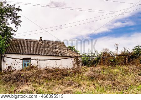 Beautiful Old Abandoned Building Farm House In Countryside On Natural Background