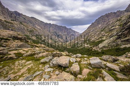 View Over Dramatic Lush Restonica Gorge From Lake Melo Near Corte On The Island Of Corsica, France