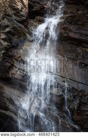 Karst Fissure In Granite Rocks Of Italian Alps, Regularly Washed Out By Waters Of Lillaz Waterfall (