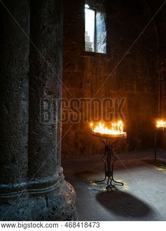 Burning Candles In The Church. Haghartsin, An Armenian Monastery Of The Xi -xiii Century, Located In