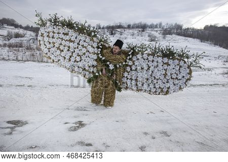Krasnoilsk, Ukraine - 13 Jan 2017: A Young Man In A Traditional Hay Bear Costume For The Malanka Cel
