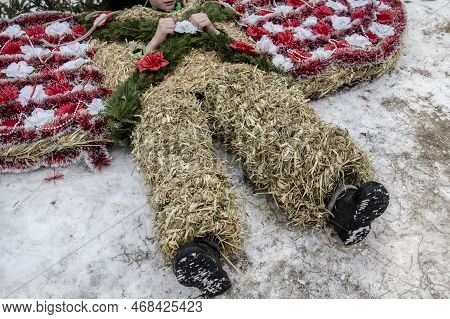Krasnoilsk, Ukraine - 13 Jan 2017: Dressing Up A Young Boy In A Straw Bear Costume On Malanka