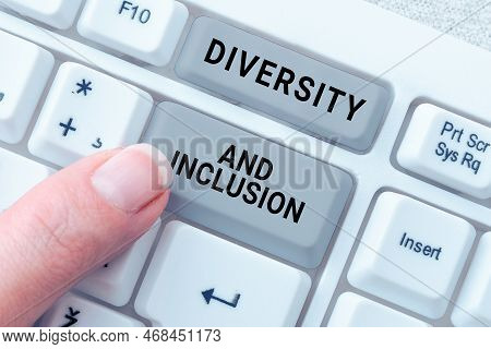 Hand Writing Sign Diversity And Inclusion. Word Written On Range Human Difference Includes Race Ethn