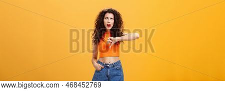 Party For Losers I Am Out. Dissatisfied Attractive Popular Girl With Curly Hairstyle In Red Lipstick