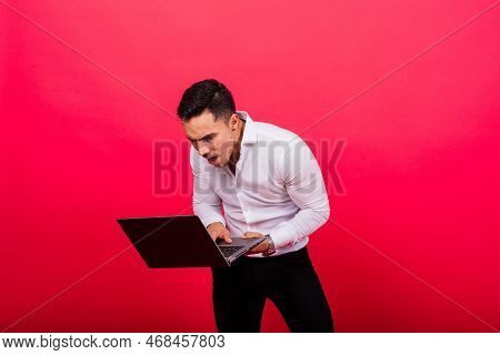Cheerful Young Guy 20s In Classic Shirt Isolated On Bright Red Wall Background Studio Portrait.