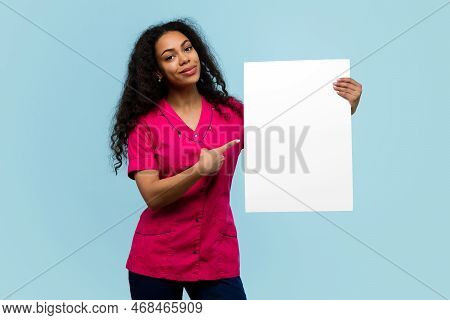 African American Female Nurse Or Doctor In Pink Uniform Holds Horizontal Banner Blank Ad Space On Bl