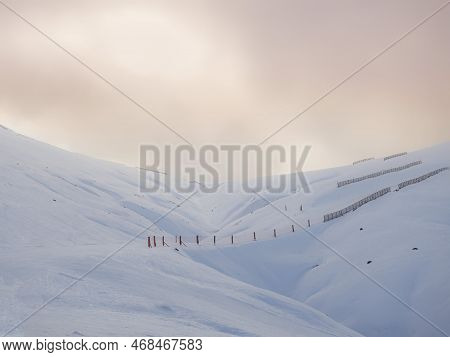 A Snowy Landscape Of Ski Slopes With A Sunset Sky, Ampriu Mountain Pass, Cerler, Huesca, Aragonese P