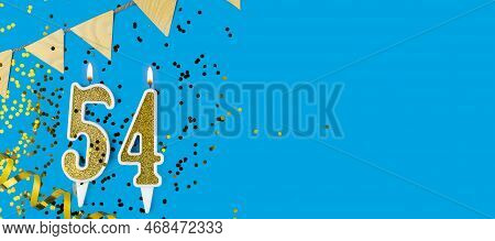Golden Candle Number Fifty Four. Birthday Or Anniversary Card With The Inscription 54 On Blue Backgr