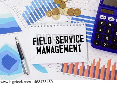 On A Bright Blue Background, Light Wooden Blocks And Cubes With The Text Fsm Field Service Managemen