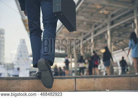 Businessman Walking With Luggage In Business Trip. Focus On Man Legs Boarding Travel Arrival Termina