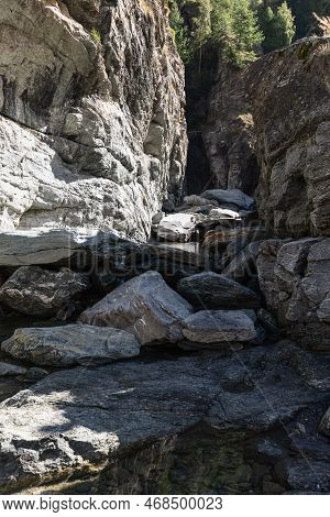 Bed Of Lillaz Waterfall (cascate Di Lillaz) Divided By Thousands Of Years Of Formation In Granite Al