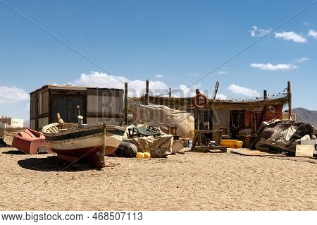Cabo De Gata, Spain - September 04, 2020: Fishing Boats And Ships Stranded On The Beach Sand In The 