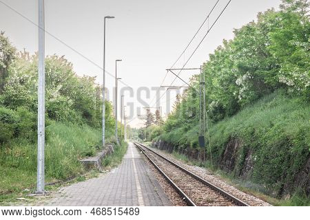 Railway Tracks, Rails And Platforms In A Suburban Train Station In Barajevo In Serbia, Electrified, 