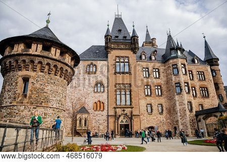 Wernigerode, Saxony-anhalt, Germany, 29 October 2022:  Castle With Tower In Harz Mountains Above Tow