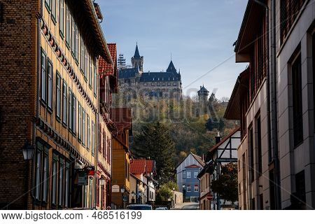 Wernigerode, Saxony-anhalt, Germany, 29 October 2022:  Castle With Tower In Harz Mountains Above Tow