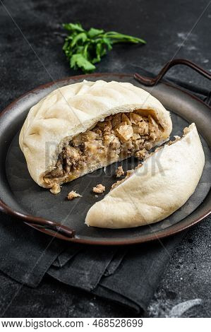 National Korean Fast Food - Steamed Pies Pyan-se Pyanse With Vegetable And Meat. Black Background. T