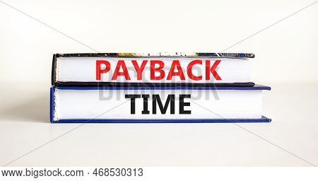 Payback Time Symbol. Concept Words Payback Time On Books. Beautiful White Table White Background. Bu