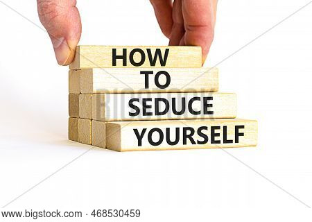 How To Seduce Yourself Symbol. Concept Word How To Seduce Yourself On Wooden Blocks. Businessman Han