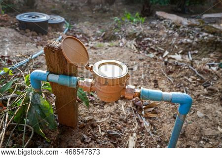 Water Meter On Water Pipe Pvc On The Ground, Old Water Meter For Check Household Water Usage Estimat