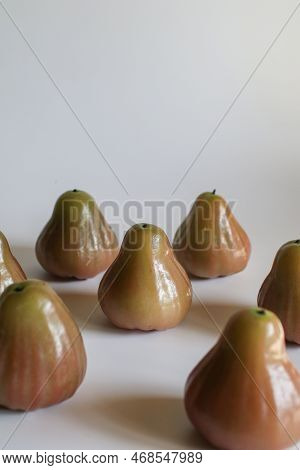 Freshly Rose Apple Or Chomphu Fruit On White Background. The Fruits Are Sweet And Red Or Green.