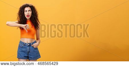 Party For Losers I Am Out. Dissatisfied Attractive Popular Girl With Curly Hairstyle In Red Lipstick