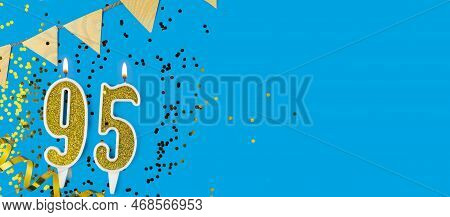 Golden Candle Number Ninety Five. Birthday Or Anniversary Card With The Inscription 95 On Blue Backg