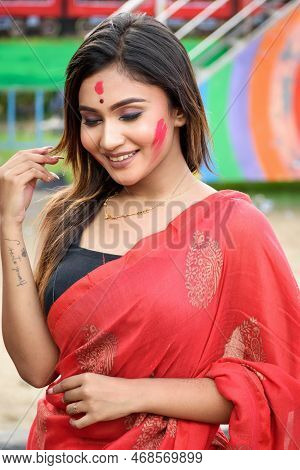 Portrait Of Very Beautiful Young Attractive Woman Wearing Traditional Bengali Outfit And Participati
