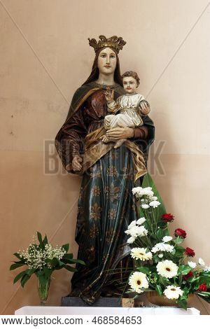 Krizevci, Croatia - May 09, 2012: Virgin Mary With Child Jesus, Statue In The Parish Church Of St. A
