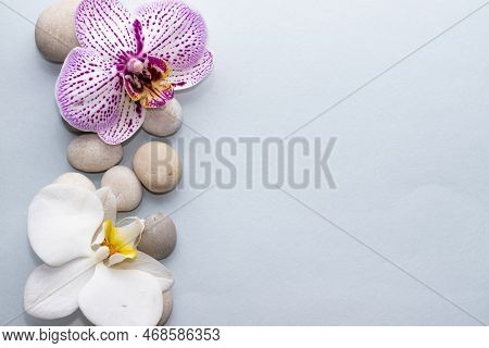 Spa Wellness Concept.pebbles Rocks In Pyramid Sea Salt And Orchid Flower